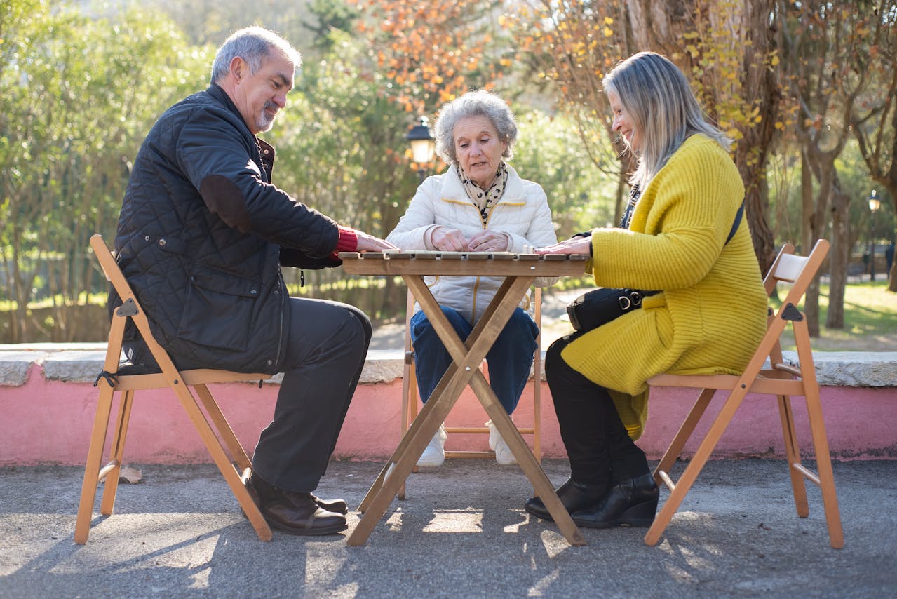 Elderly people playing dominoes at Domino Park in Little Havana, Miami