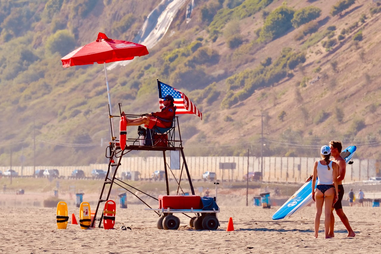 Lifeguard tower with safety flags at Haulover Beach Miami