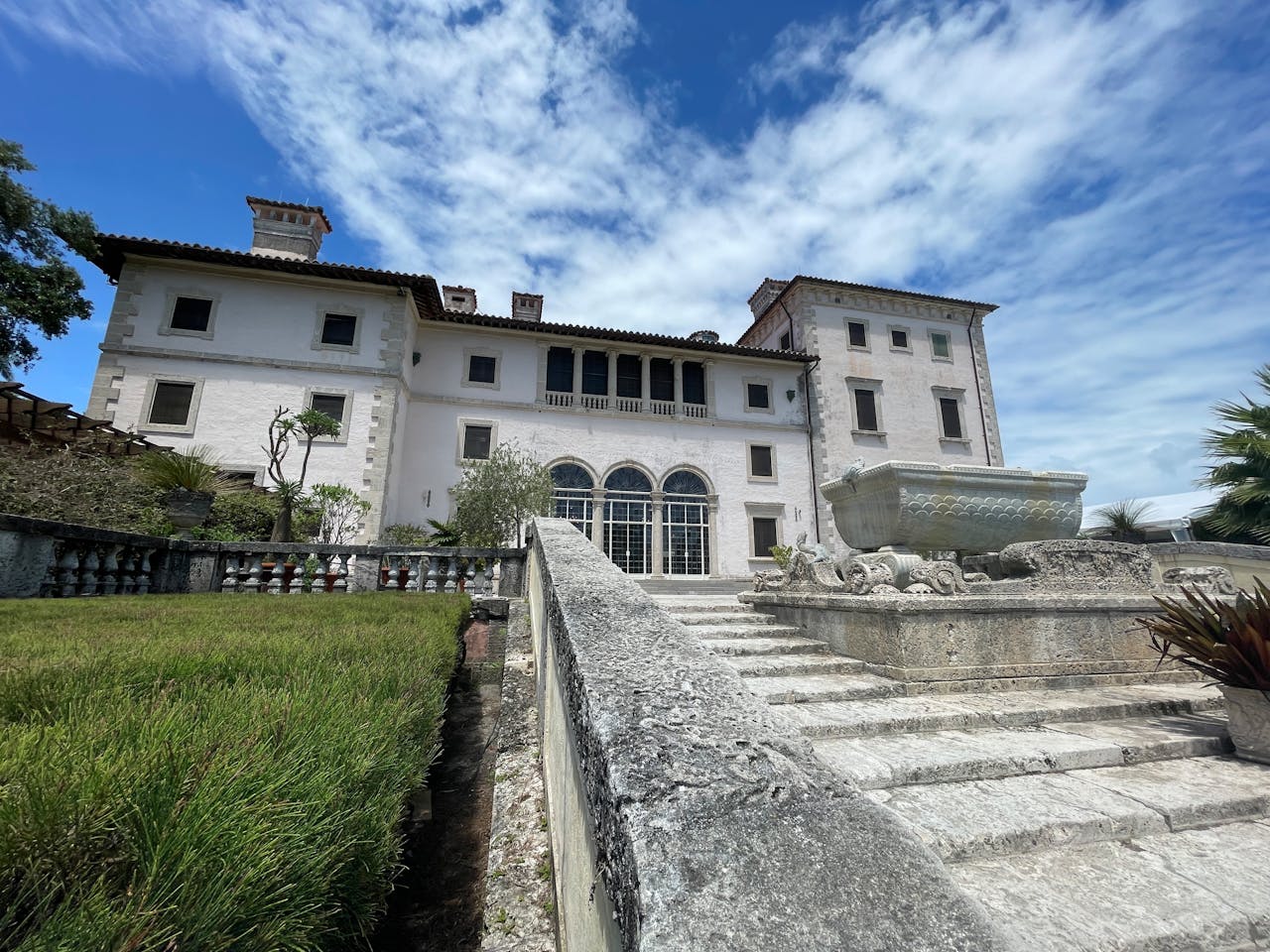 Historic Vizcaya Museum and Gardens with lush landscaping in Coconut Grove