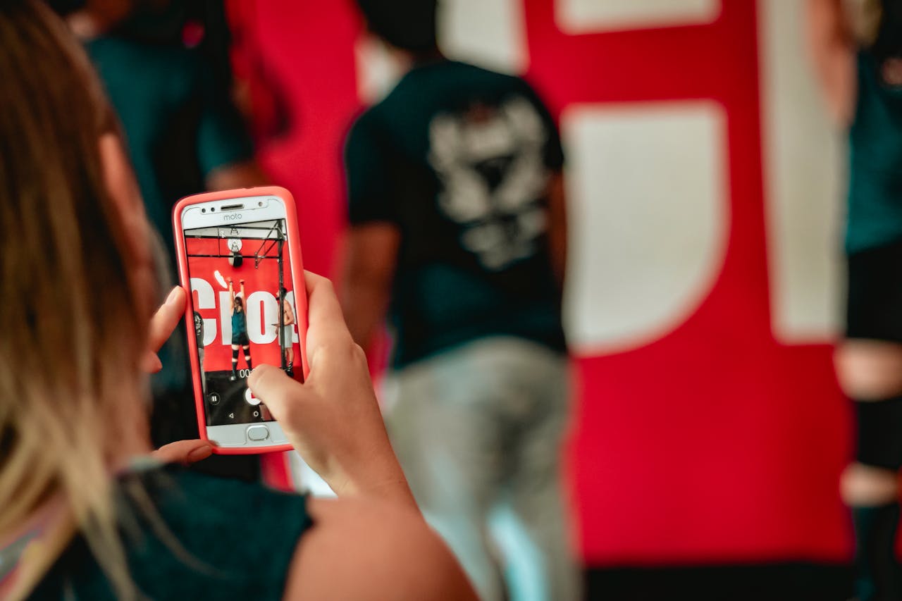 Tourist taking photos at a famous Wynwood mural for social media