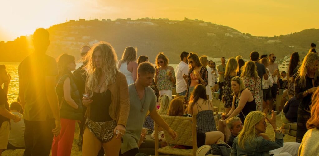 Group of people participating in a naturist event at Blind Creek Beach